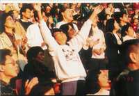 Crowd Praising God
